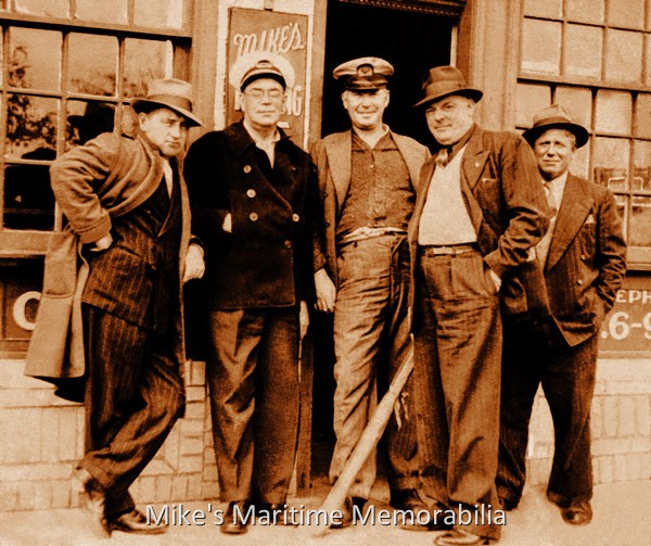 "Da Boyz of Sheepshead Bay", Brooklyn, NY – 1945 Shown standing in front of Mike Maffai's Tackle & Bait Shop on Emmons Avenue, Sheepshead Bay, Brooklyn, NY are, from left to right, Captain Herbie Hammer (the "WHITBY II"), Captain Fred Wrege (the "EFFORT III"), Captain Axel 'Alex' Hanson (the "HELEN H"), Mr. Maxwell and his partner, Captain Kaspar Bonsignor ("OLD PAL"). This 1945 photo is courtesy of the Captain Fred Wrege and Captain Charles VanDerVoort Families.