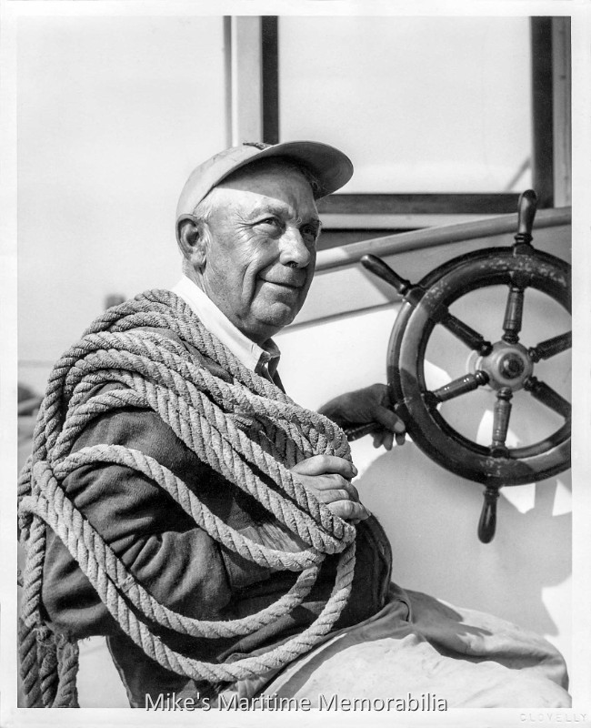 Captain John Boshler, Bay Shore, NY – 1953 Captain John 'Chicken' Boshler at the helm of his boat "DORIS", of Bay Shore, Long Island, NY circa 1953. At the time, he was the Secretary of the National Party Boat Owners Alliance and was also one of its founders in 1952. Rumor has it that he would send messages ashore via carrier pigeon. Now that was a novel, if not ancient, means of communication! Obviously, it did not catch on with the rest of the fleet and the radiotelephone won out. Photograph by Cecil Clovelly.