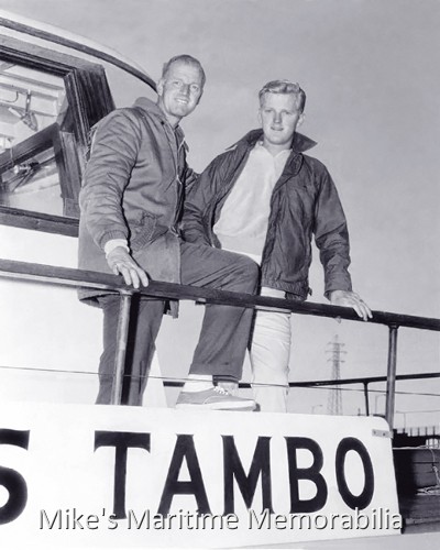 Captains Ed Keefe Sr. and Jr., MISS TAMBO, Brielle, NJ – 1967 Captains Ed Keefe Sr. and Jr. aboard the "MISS TAMBO", Brielle, NJ circa 1967. Captain Ed was the operator of the charter boat "TAMBO V" from Brielle, NJ and took over the helm of the "TAMBO III" from his Dad, John 'Candy' Keefe in 1956. In 1962, the Gillikin-built "MISS TAMBO" replaced the "TAMBO III" and the family business continued for another generation. Ed Keefe Jr. worked the deck of the "MISS TAMBO" along with his Dad until entering the US Navy. In 1984, Captain Ed retired, sold the "MISS TAMBO" and moved to Florida where he continues to enjoy the warm climate and the good life. Photo courtesy of Ed Keefe Jr.