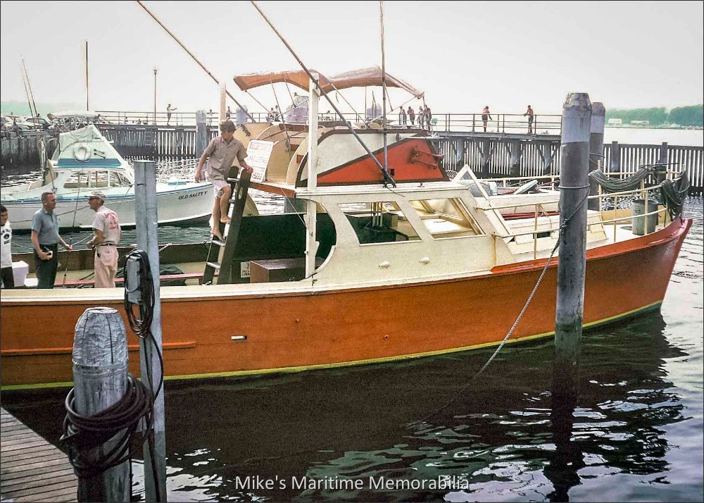 SHY POKE, Belmar, NJ – 1967 The charter boat "SHY POKE" from Belmar, NJ circa 1967. The 45-foot "SHY POKE" was built in 1956 at Rock Hall, MD and is seen at her slip at the Belmar Marine Basin prior to a charter trip in September 1967. From left to right are Belmar Dockmaster Bob Hewitson (in blue shirt) and Captain Bill Guenther (in khakis). In the background is the "OLD SALTY V", a 32-foot charter boat built in 1964 by Troth Boat Works at Tuckahoe, NJ. It was operated by Les Taylor and its home port was Perth Amboy, NJ. The photo is courtesy of Tim Easler.