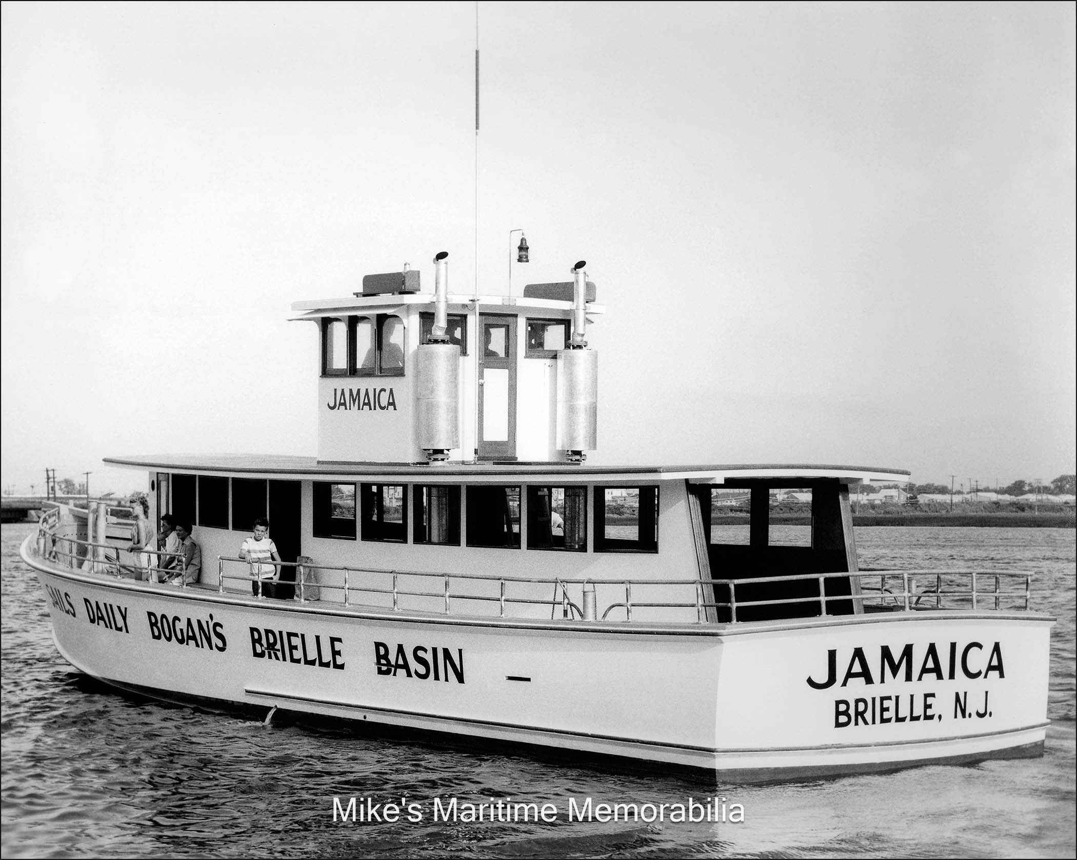 JAMAICA, Brielle, NJ – 1957 The original "JAMAICA", from Bogan’s Brielle Basin, Brielle, NJ circa 1957. Stowman Shipyards, Dorchester, NJ built this 65 foot boat in 1957 and two GM 110 diesels provided the power. Captain Howard Bogan Sr. initially operated the "JAMAICA" and was later followed by Captain Dave Bogan Sr. This particularly nice picture was taken before a dodger was built around the pilothouse. She later became the "JAMAICA II" and then became Captain William Egerter Jr's "DAUNTLESS 2" and sailed from Broadway Basin, Point Pleasant Beach, NJ. In 1974, she became the "ATLANTIS" and then the "ATLANTIS II". After that, she sailed as the "RELIABLE III" from Bowers Beach, DE and after that she was remodeled, re-powered, relocated to Cape May, NJ and last sailed as the "SEA STAR II". The photo is courtesy of Captain Dave Bogan Sr. [This is Mel's favorite picture... What a beauty!]