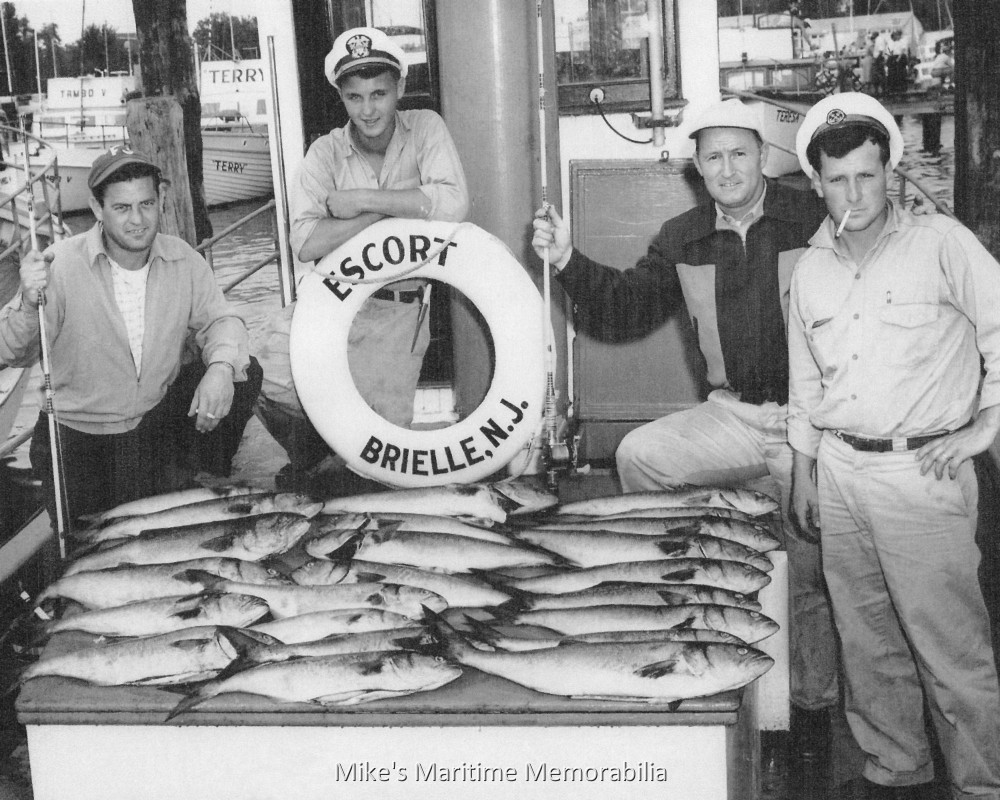 ESCORT, Brielle, NJ – 1955 A young Captain John W. Long Jr. operated the "ESCORT" from Bogan's Basin, Brielle, NJ in this 1955 photo. The catch of the day was Bluefish.