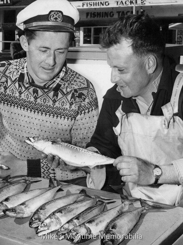 Mackerel Catch, Brielle, NJ – 1960 Captain John W. Long Jr. and an angler check out the day's Mackerel catch circa 1960.