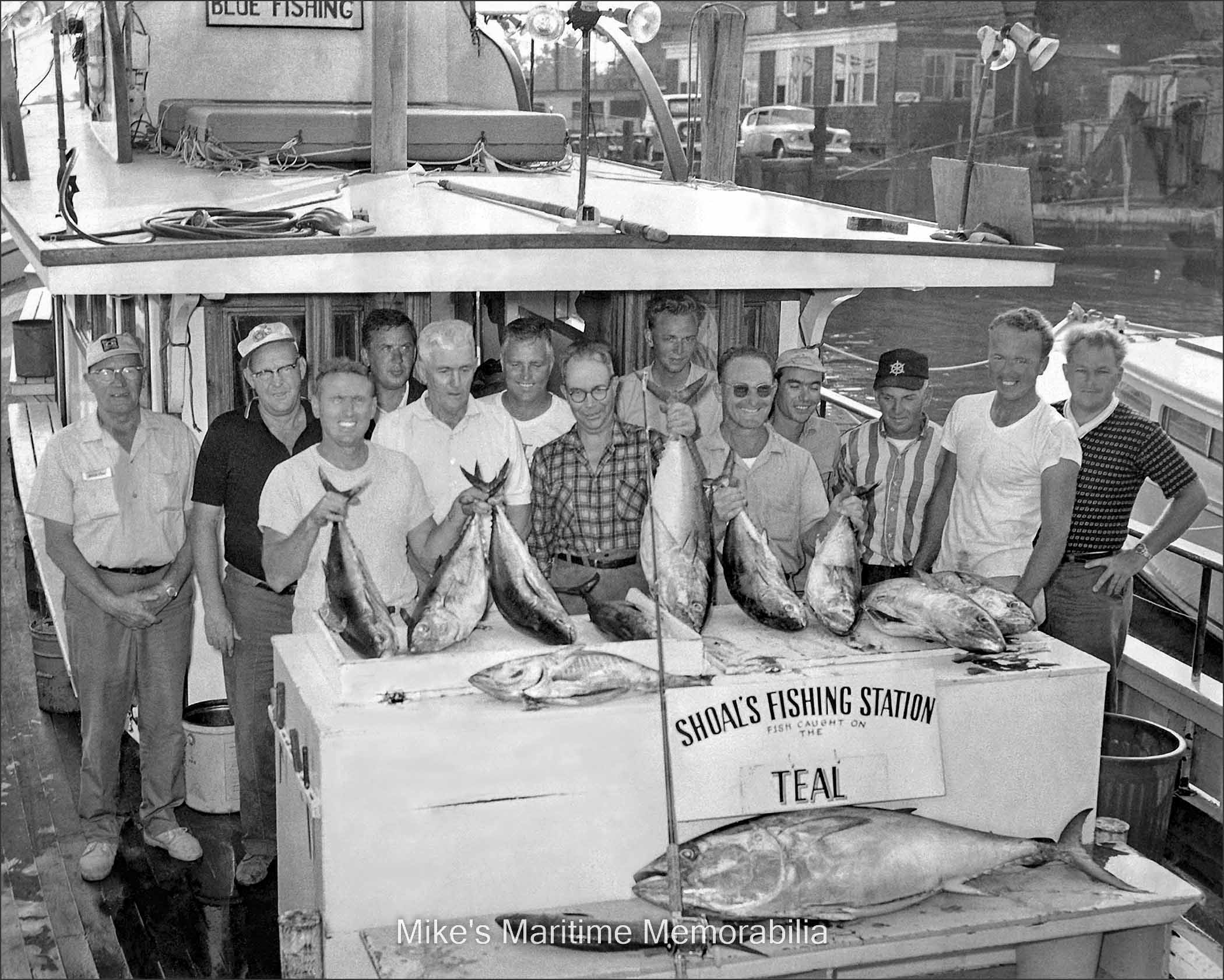 TEAL Tuna Trip, Staten Island, NY – 1966 The results of a 'Mud Hole' tuna fishing trip aboard the "TEAL" in 1966. At the left of the bait box and holding a couple of tuna, is Captain 'Freddie' Moore of the "TEAL". At the right of the bait box and wearing a white t-shirt, is "TEAL" First Mate Ken Ekberg. Wearing a striped shirt and baseball cap is a very young Captain Marty Haines Jr. of the "MAJESTIC" and "SEA PIGEON" from Perth Amboy, NJ. The photo is courtesy of Ken Ekberg.