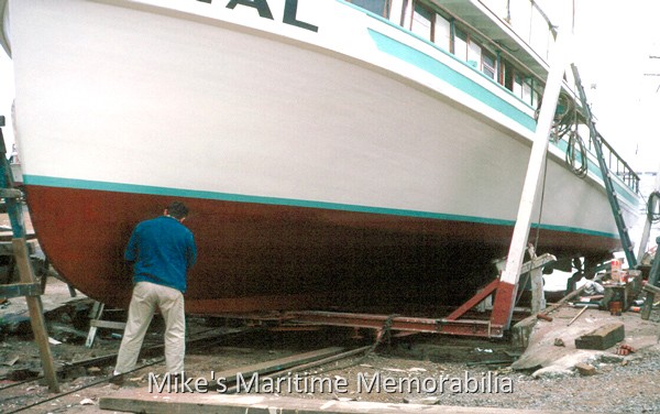 TEAL, Great Kills, NY – 1965 Captain Fred Moore is putting the last touches of paint on the "TEAL" before the start of the 1965 fishing season. The "TEAL" hauled out twice a year at Peterson's Boatyard, Great Kills Harbor, and sometimes hauled out a third time if they damaged the propellers or shafts during their night bluefishing trips. Photo courtesy of Ken Ekberg.
