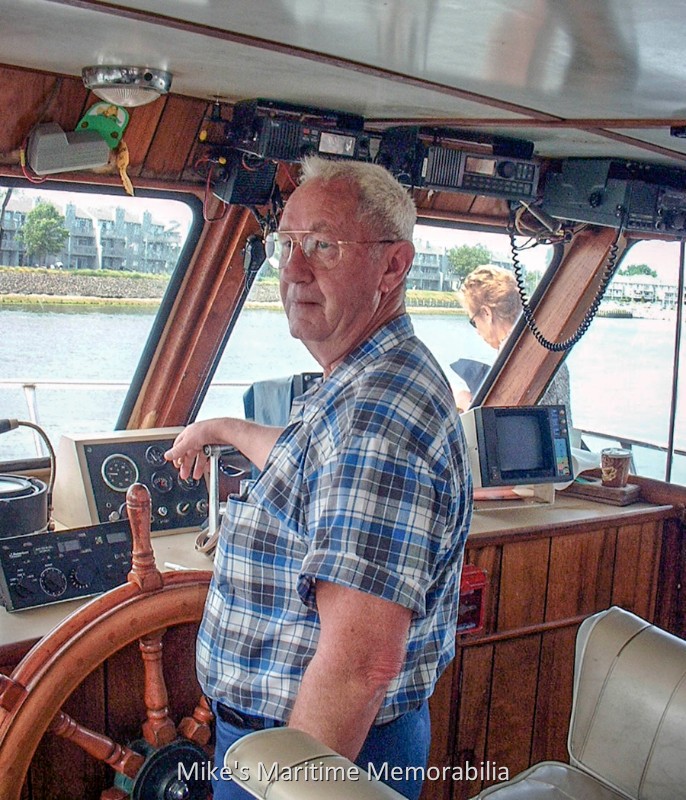Captain Norm at the helm of the GOLDEN EAGLE Captain Norm Mordaunt at the helm of the party boat GOLDEN EAGLE. The boat was on its way from Belmar, NJ with holiday revelers to view the Macy's Fireworks in New York Harbor on July 4, 2004. Captain Norm was employed for many years as the senior Captain on the GOLDEN EAGLE Photo courtesy of Joe Galluccio.