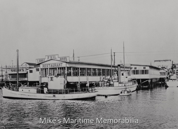 LUNDY BROS. PIER & RESTAURANT, Sheepshead Bay, Brooklyn, NY – 1931 This 1931 photo of Sheepshead Bay shows the Lundy Brothers Pier and Restaurant, and from left to right, the fishing boats "NAUTILUS", "EFFORT", and "EFFORT III". In the early 1900s, Irving Lundy started selling clams from a pushcart. In 1907, he opened a clam bar built on stilts over Sheepshead Bay, and in 1926 opened his first restaurant (the one in this photo.) He closed it when the WPA started renovating the Sheepshead Bay waterfront in the early 1930s. In 1934, Lundy, along with family members, built the restaurant located at 1901 Emmons Avenue. The clam bar and the restaurant were decorated with the letters "F.W.I.L.", standing for "Frederick William Irving Lundy". That was his full name, but he preferred to be called Irving. His brothers Clayton and Stanley died in January 1920 in a boating accident while tending the family's Jamaica Bay clam beds. Another brother, Allen, survived and helped Irving manage the restaurant.