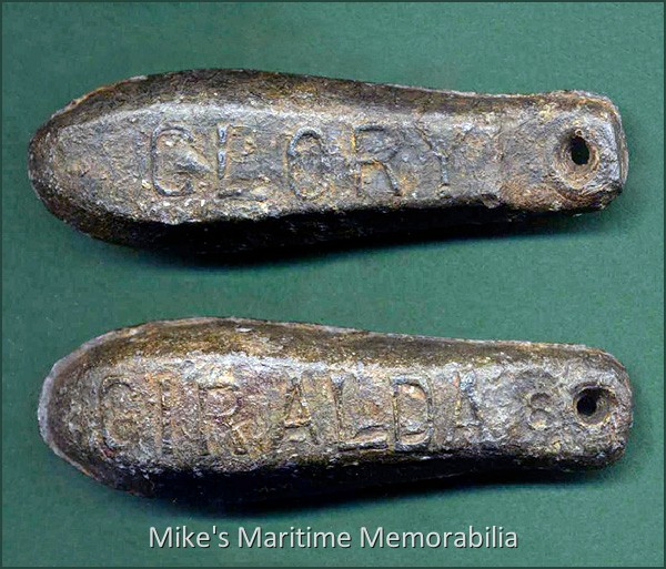 GLORY & GIRALDA Sinker, Brooklyn, NY – 1925 During the 1920s and 1930s, it was popular for party boats to personalize their fishing sinkers by inscribing their sinker molds with the name of their vessel. During this time, the Martin Brothers' "GLORY" and "GIRALDA" from Sheepshead Bay, Brooklyn, NY regularly fished the wrecks located off the New Jersey coast and they used a personalized sinker that had the GLORY name on one side and GIRALDA on the other. This circa 1925 8-ounce sinker was recovered in 2011 from the wreck of the "DELAWARE" located off Bay Head, New Jersey by 'Bartman', while diving from the dive boat "GYPSY BLOOD". Sinker courtesy of local wreck diver 'Bartman'.