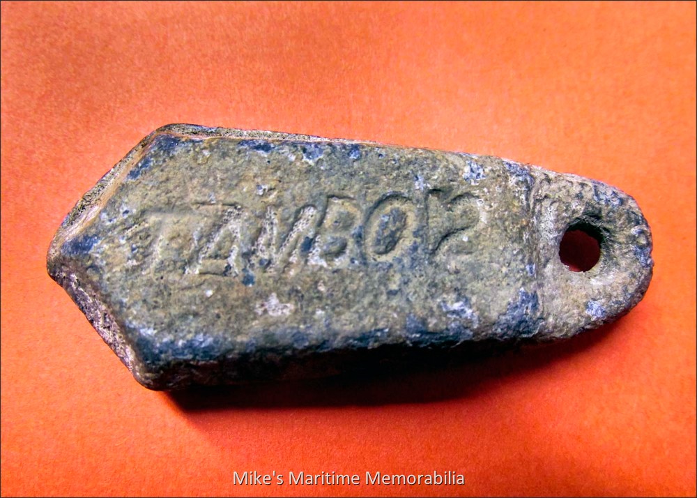 TAMBO II Sinker, Brooklyn, New York – 1935 Personalized fishing sinkers such as this were very common aboard party boats during the 1920s and 1930s. Local divers indicate that these 'old style' sinkers are only found on inshore wrecks and rock structures, which agrees with the facts that boatmen of the era relied on visual shore ranges to locate their wrecks, and that the abundance of fish at the time made it unnecessary to go far offshore. Sadly, divers collected these types of sinkers from the ocean floor for years and sold them as scrap metal, and very few have survived. We consider ourselves very lucky to have this sinker from Captain Bill Cronan’s "TAMBO II" that sailed from the Canarsie section of Brooklyn, NY and others like it on display. Sinker courtesy of Captain and diver Stan Zagleski III of the "ELAINE-B II" from Highlands, NJ.