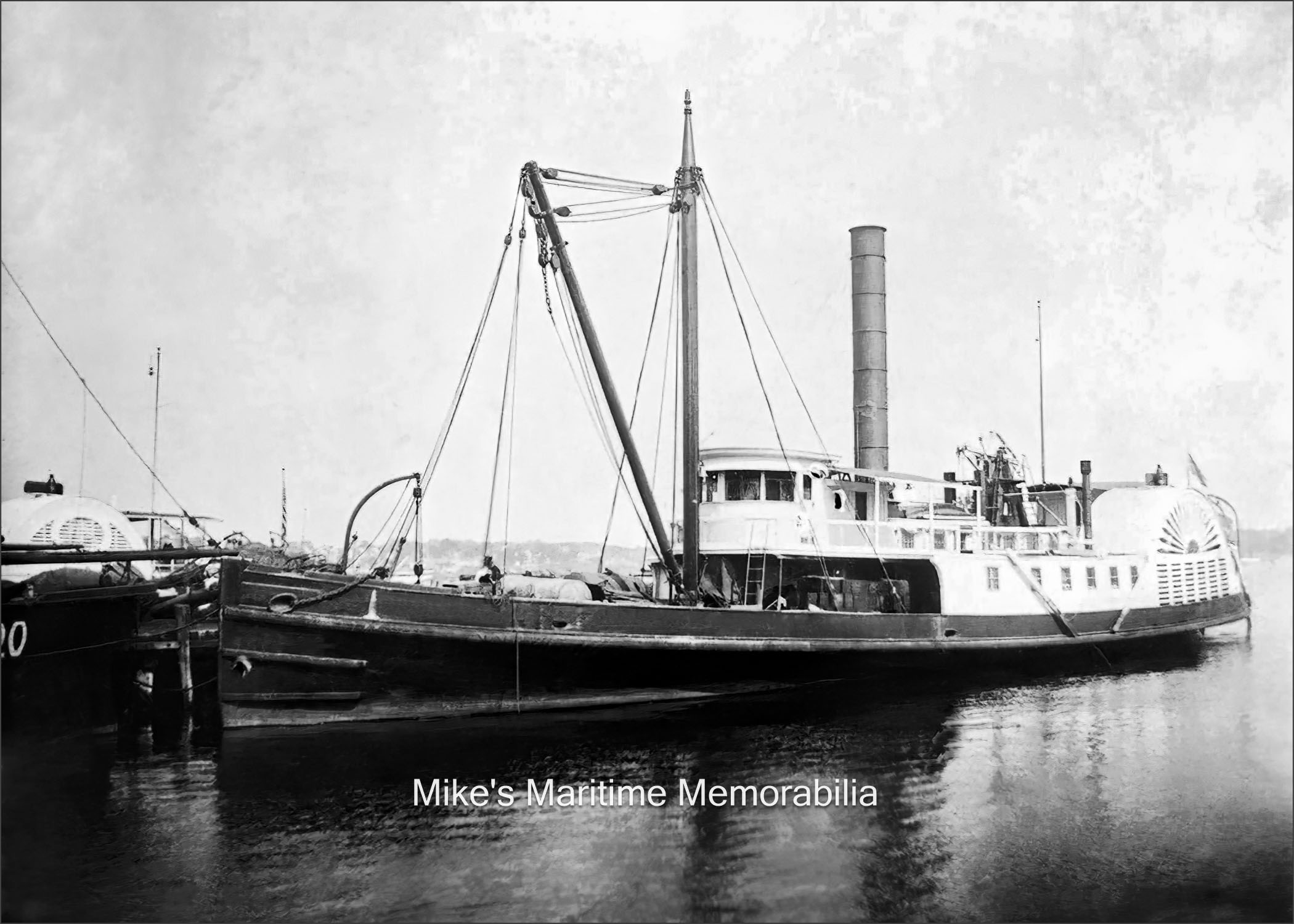 MISTLETOE, New York, NY – 1899 The "MISTLETOE" was a sidewheel steamboat built in 1872 at Chester, Pennsylvania. At the time of this photo, she was owned by the United States Light-House Establishment and operated as a Light House Tender bringing supplies to light houses. She was later sold and at some point began taking parties of anglers from Manhattan's Battery to the fishing grounds. On May 5, 1924 she caught fire while underway to the fishing grounds off Far Rockaway, burned to the waterline and sank. Captain Dan Gully, who owned the "MISTLETOE", was in command of the vessel at the time with 74 passengers aboard, all of whom were safely transferred to other fishing vessels before she went down. Known by local fishermen as "The East Wreck", she still produces various types of bottom fish to this day.