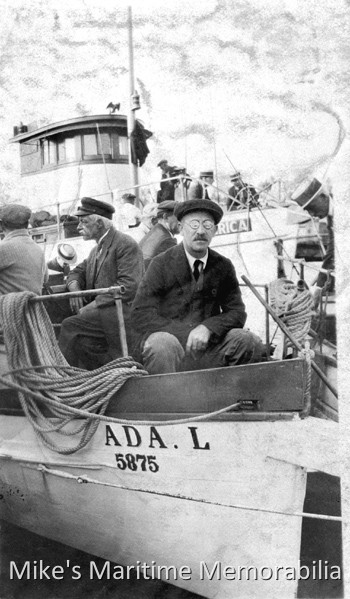 ADA L, Brooklyn, NY – 1919 The "ADA L" from Sheepshead Bay, Brooklyn, NY circa 1919. In 1919, Captain Adam 'Eddie' Doll returned from duty in World War I and desperately wanted to return to the fishing industry, so he purchased the "ADA L". She leaked badly and took seas over the bow at anchor (the gent shown sitting in the bow probably got pretty wet later on in the day.) Later that year, he sold the boat to Captain John 'Candy' Keefe for $400. Captain Doll told Captain Keefe about all of her shortcomings, but he bought the boat anyway, fixed her up and did well with her. Captain John Michaels' "AMERICA" is in the background (she later became Captain Pete Saro's "SPRAY II" from Belmar, NJ.) Captain Doll's son Bill later became one of the oldest active party boat skipper in the area and Captain Keefe later went on to own the "TAMBO". The photo is courtesy of Ed Keefe Jr.