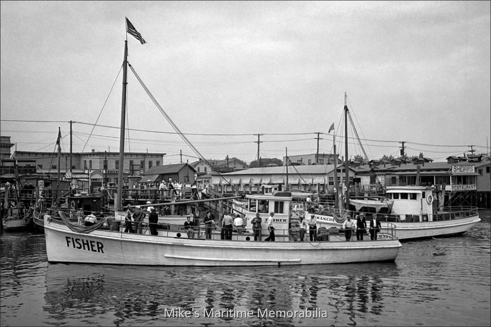 FISHER, Brooklyn, New York – 1933 The "FISHER", skippered by Captain Frank Swartzbach, is seen here pulling into her pier along Sheepshead Bay's Emmons Avenue in July of 1933. In the background is Captain Joe Moravec's "COMANCHE II". The "FISHER" was built in 1927 at Brooklyn, NY and at the time she was the largest vessel from Sheepshead Bay built specifically for party boat fishing. In 1949, she was sold to Captain Jackie Michaels and she continued to sail from Sheepshead Bay as his "AMERICA". She later sailed for one season as Captain Walter Zirkle's "BROOKLYN" and later as Captains "Red" Tanfield and Jerry Nappi's "CAPT. RED".