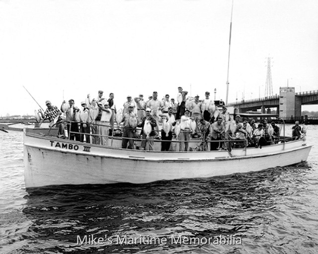 TAMBO III Fluke Catch – 1959 The "TAMBO III" returned from a fabulous day of 'Jumbo Jersey Fluke Fishing' on August 30, 1959. It looks like most anglers had at least one Fluke in the six to seven pound range and there is a guy standing near the bow with a real monster. (Check out the next picture and you'll see what we mean.) Veteran Fluke specialist, Captain Ed Keefe Sr. operated the "TAMBO III" from Harbor Inn Basin, Brielle, NJ for many years. Photo courtesy of Ed Keefe Jr.
