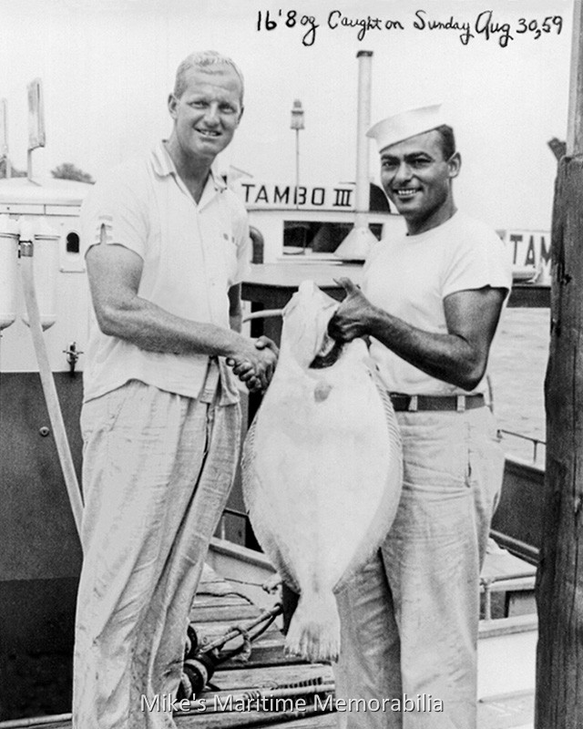 TAMBO III Pool Fish – 1959 Captain Ed Keefe Sr. congratulates angler Marvin Schaffel, who landed a 16½-pound doormat Fluke aboard the "TAMBO III" from Harbor Inn Basin, Brielle, NJ on August 30, 1959. The monster Fluke was the largest caught on the "TAMBO III" that year and it was taken while drifting over a wreck located four miles from Manasquan Inlet. Photo courtesy of Ed Keefe Jr.